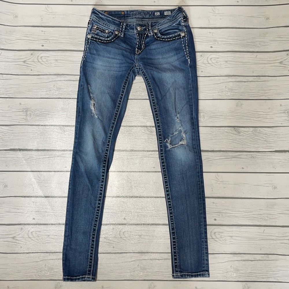 Distressed miss me skinny jeans
